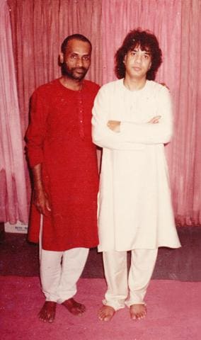 Zakir Hussain and Kavi Narayan Agrawal standing together