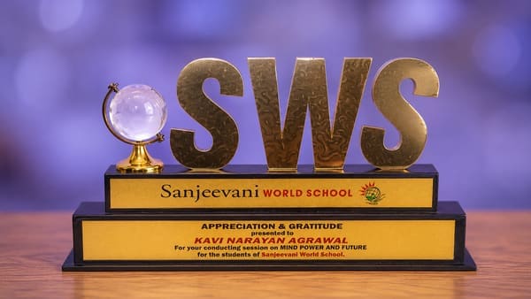 Sanjeevani World School memento, for his Mind Power and Future session for students.